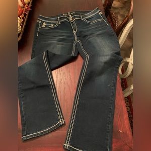 Ariya jeans that are boot cut and resemble Miss Me jeans no holes or wear.